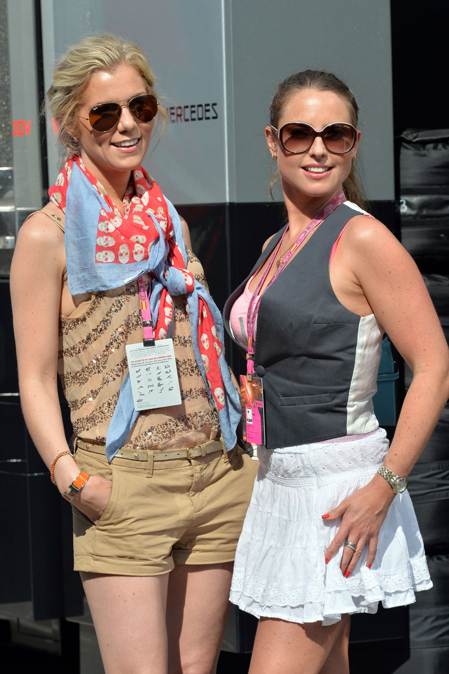 Two VIPs enjoy the sunshine in the paddock
