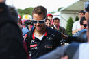 Sebastian Vettel arrives in the paddock ahead of the race