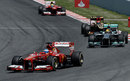 Fernando Alonso leads Lewis Hamilton early in the race