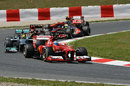 Fernando Alonso leads Lewis Hamilton early in the race