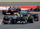 Nico Rosberg leads Sebastian Vettel on track