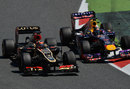 Kimi Raikkonen goes wheel to wheel with Sebastian Vettel in turn two