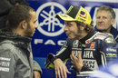 Lewis Hamilton chats to Valentino Rossi in the Yamaha garage