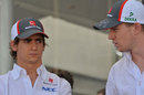 Esteban Gutierrez and Nico Hulkenberg chat in the paddock