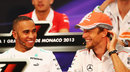 Lewis Hamilton and Jenson Button share a joke in the driver press conference