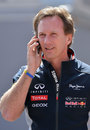 Christian Horner on the phone in the paddock