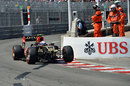Romain Grosjean limps back to the pit lane with a broken front wing