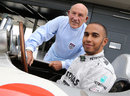 Sir Stirling Moss and Lewis Hamilton pose for a photo with a Mercedes W196