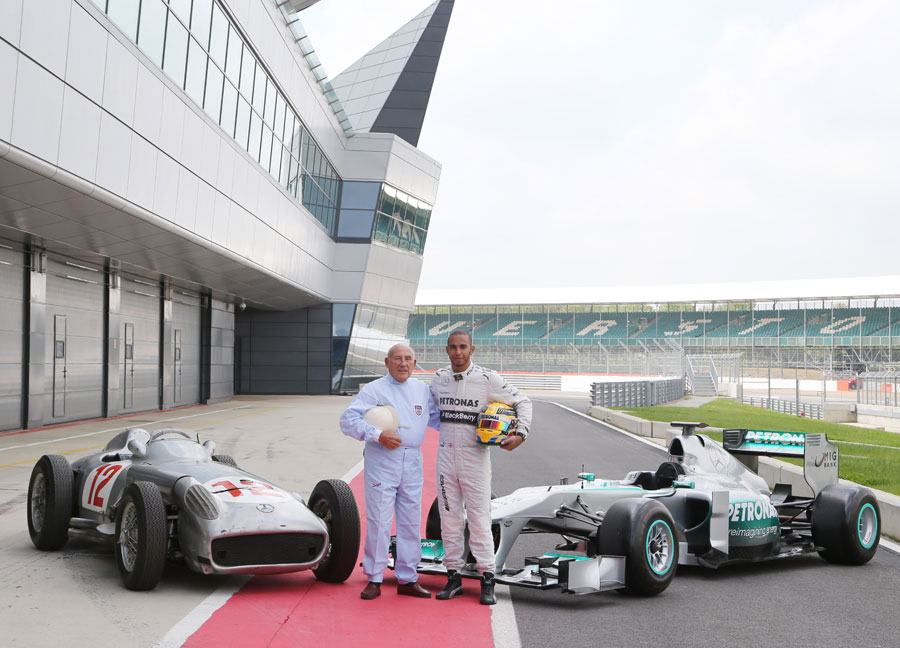 Sir Stirling Moss and Lewis Hamilton pose for a photo with a Mercedes W196 and Mercedes W02