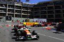 Adrian Sutil leads Fernando Alonso and Jenson Button out of Loews