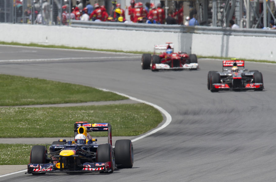 Sebastian Vettel leads Lewis Hamilton and Fernando Alonso