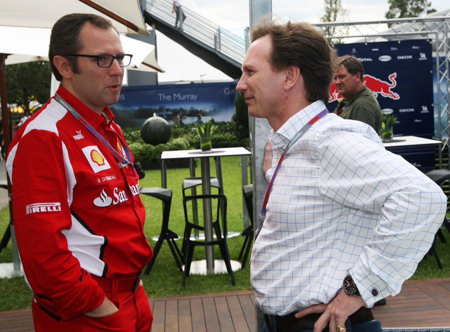 Christian Horner and Stefano Domenicali in conversation ahead of the grand prix weekend