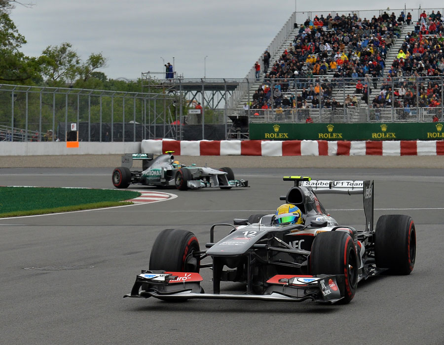 Esteban Gutierrez leads Lewis Hamilton