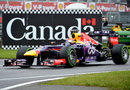 Sebastian Vettel returns to the pits in the Red Bull