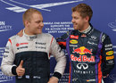 Sebastian Vettel congratulates Valtteri Bottas in parc ferme
