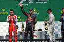 Sebastian Vettel waves to the crowd on the podium