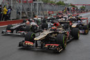 Kimi Raikkonen and Daniel Ricciardo line up out of place for the restart of the session