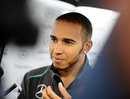 Lewis Hamilton faces the media