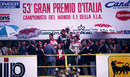 Rene Arnoux is flanked by a pair of Ferrari drivers on the Monza podium