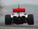 Jenson Button pushes the limits of adhesion
