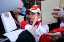 Giancarlo Fisichella signs autographs at the opening of the Ferrari Store in Kiev