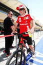 Fernando Alonso on his bicycle ahead of the Bahrain Grand Prix