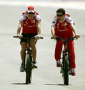 Fernando Alonso cycles the circuit ahead of the Bahrain Grand Prix