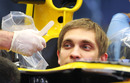 Vitaly Petrov has a seat fitting