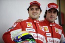 Ferrari's Fernando Alonso and team mate Felipe Massa pose in the Bahrain paddock