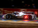 The No.2 Audi of Tom Kristensen, Allan McNish and Loic Duval powers through the night