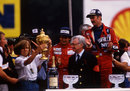 Virginia Williams takes the constructors' trophy on behalf of Frank Williams while he recovered from the accident that paralysed him from the chest down