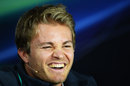 Nico Rosberg shares a joke with journalists at the press conference