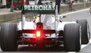 Nico Rosberg leaves the pits running a drag reduction device