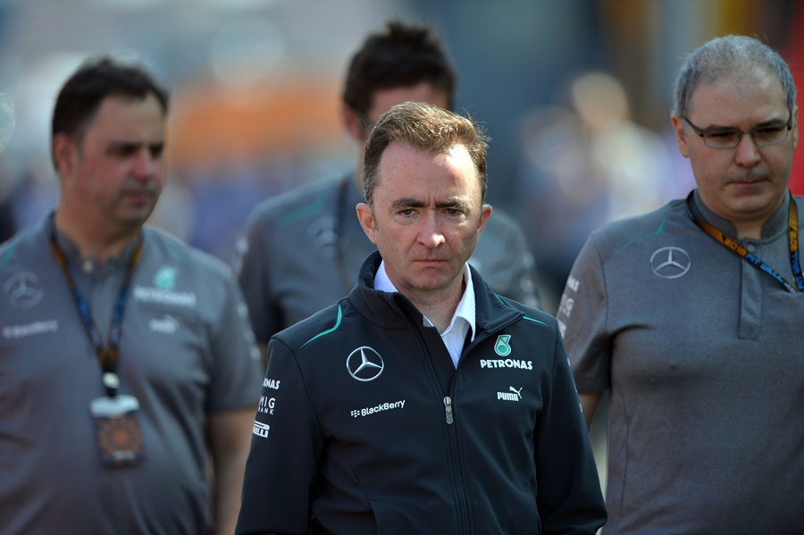 Paddy Lowe arrives at the circuit with Mercedes team members on Saturday morning