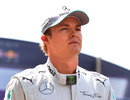 A dejected Nico Rosberg walks through the paddock after failing to make the cut for Q3