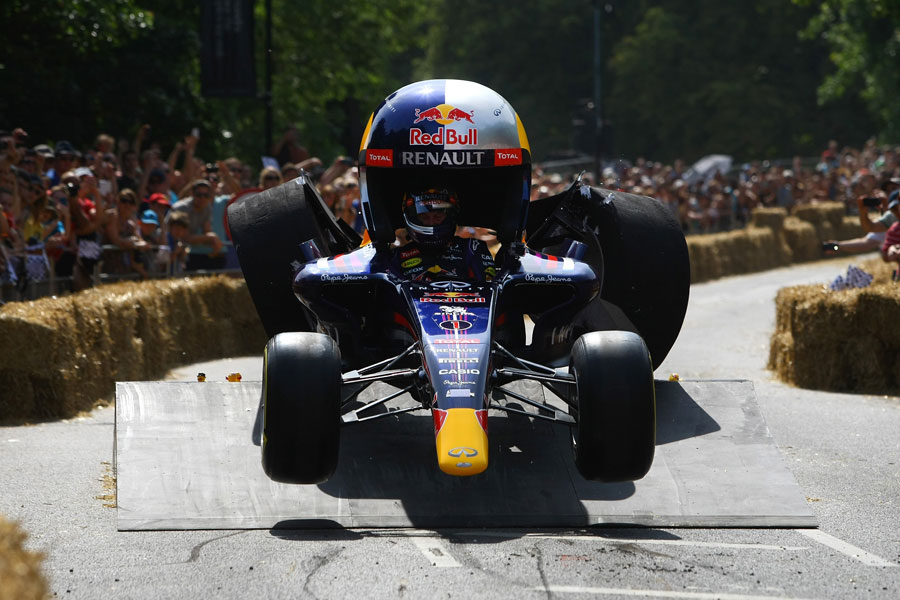 Christian Horner takes part in a soapbox derby event in a vehicle made of old bits of Formula One car