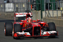 Davide Rigon heads down the pit lane in the Ferrari