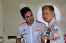 Kevin Magnussen talks to his engineer