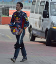 Daniel Ricciardo grimaces as he heads back to the Red Bull garage
