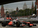 Jenson Button drives in front of the Kremlin during the Moscow City Racing show