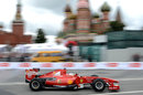 Kamui Kobayashi drives in front of the Kremlin during the Moscow City Racing show