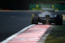 Lewis Hamilton kicks up some dust on a hot lap