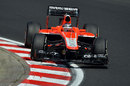 Jules Bianchi mounts the kerb in the Marussia