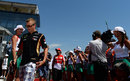 Kimi Raikkonen heads for the drivers' parade
