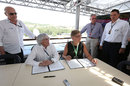 Bernie Ecclestone signs a contract extension for the Hungarian Grand Prix
