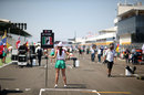 A grid girl waits for the arrival of Esteban Gutierrez on the grid