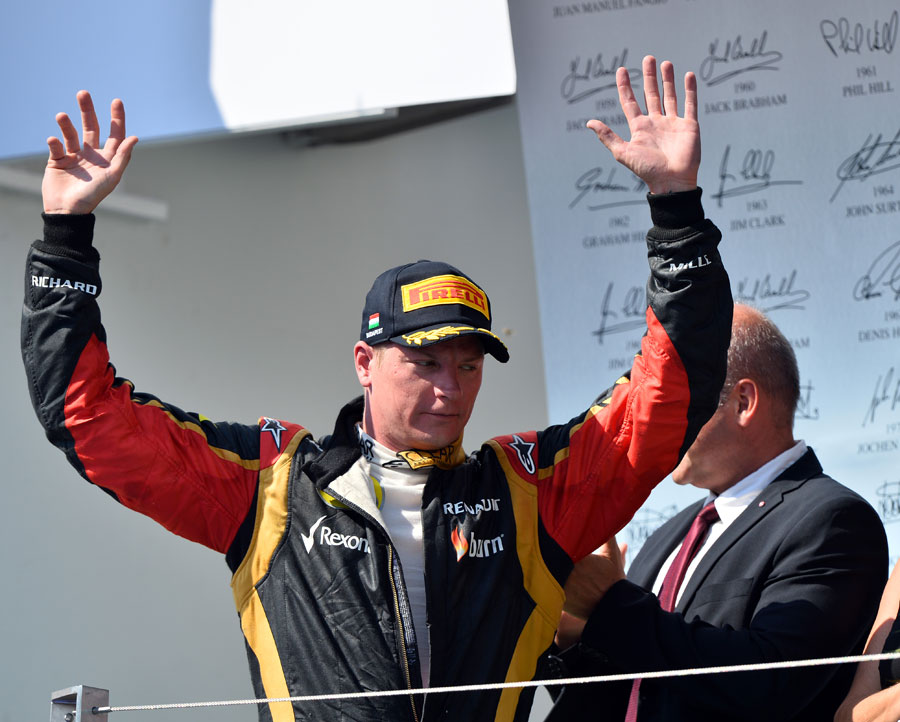Kimi Raikkonen celebrates second place