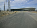 Construction of the Russian Grand Prix circuit continues with the Winter Olympic village in the background