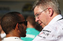 Ross Brawn has a quiet word with Lewis Hamilton after the race