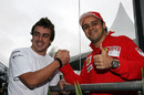 New Ferrari team-mates Massa and Alonso pose for a photo